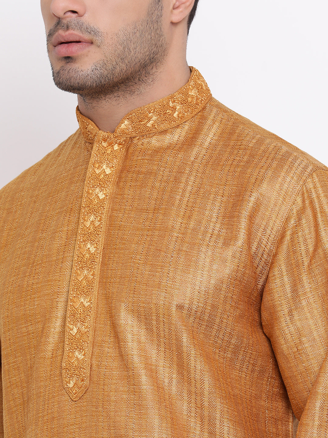 Full Sleeve Embroidered Kurta and Churidar Set in Gold Cotton Blend